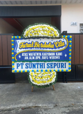 Papan Bunga Duka di Nikan Jaya