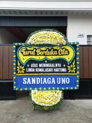 Papan Bunga Duka di Nikan Jaya