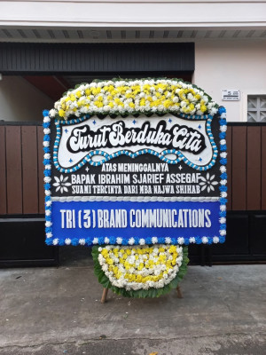 Papan Bunga Duka di Nikan Jaya